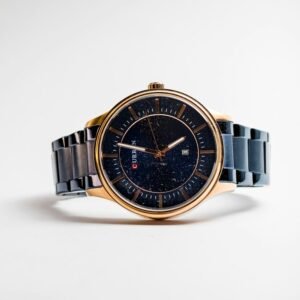 Two-tone gold and steel watch with a dark dial