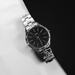 Brushed steel bracelet watch with a black dial